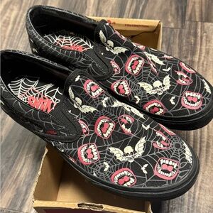 Vans Black Slip-On Shoes with Skull and Mouth Design